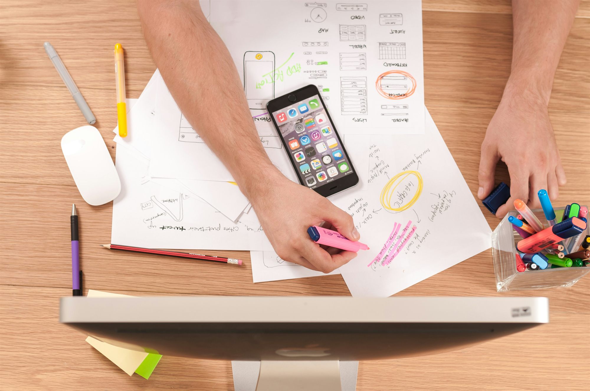 Marketing strategy planning with sketches, notes and a smartphone
